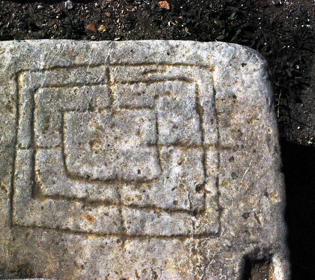Nine Men's Morris board carved into stone at the ruins of St. John's Basilica in Selcuk, Turkey